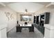 Home office with a large window offering scenic views and custom built-ins at 9265 Roadrunner St, Highlands Ranch, CO 80129