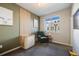 Bedroom with olive green walls, decor, and a crib by the window at 2602 W 24Th Ave # 6, Denver, CO 80211