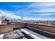 The rooftop boasts stylish seating, with a fire pit, and panoramic city views, creating a perfect urban retreat at 2602 W 24Th Ave # 6, Denver, CO 80211