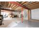 Unfinished basement with exposed ductwork, providing ample potential for customization and storage at 17378 W 78Th Dr, Arvada, CO 80007
