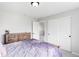 Comfortable bedroom featuring carpet floors, with a closet and ample storage space at 17378 W 78Th Dr, Arvada, CO 80007