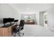 Spacious bonus room featuring a desk area, and an open floorplan perfect for entertaining at 17378 W 78Th Dr, Arvada, CO 80007