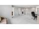 Spacious bonus room with neutral carpet, offering versatile living space and a cozy atmosphere at 17378 W 78Th Dr, Arvada, CO 80007
