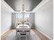 Inviting dining area with a large window providing ample natural light at 17378 W 78Th Dr, Arvada, CO 80007