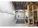 Unfinished basement area ready for customization with exposed beams and studded walls at 10962 Vaughn St, Commerce City, CO 80022