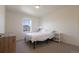 Cozy bedroom with natural light, carpeted floors, and modern furnishings at 10962 Vaughn St, Commerce City, CO 80022