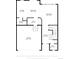 Floorplan showing kitchen, dining area, living room, hall, garage, foyer, and bath at 10962 Vaughn St, Commerce City, CO 80022