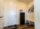 Functional mudroom features a storage bench, shoe rack, and convenient access to the entryway at 10962 Vaughn St, Commerce City, CO 80022