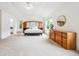 Spacious, bright bedroom includes carpet, windows, light walls and ceiling fan with light at 10166 Grove Loop # D, Westminster, CO 80031