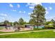 Enjoy the community playground and pool on a sunny day at 10166 Grove Loop # D, Westminster, CO 80031
