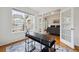 Inviting office space featuring a stylish desk and views into the bright living room at 10166 Grove Loop # D, Westminster, CO 80031