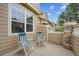 Relaxing patio area with comfortable chairs, perfect for outdoor lounging at 10166 Grove Loop # D, Westminster, CO 80031