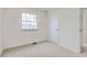 Cozy bedroom with neutral carpet, a window, and a closet at 11864 E Idaho Dr, Aurora, CO 80012