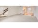 Bright and airy living room featuring neutral carpeting and an open floor plan at 11864 E Idaho Dr, Aurora, CO 80012