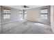 Bright bedroom with ceiling fan and carpet flooring at 10870 Unity Way, Commerce City, CO 80022