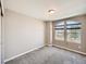 Bright bedroom featuring two large windows with blinds at 10870 Unity Way, Commerce City, CO 80022