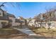 Exterior view of townhouses with landscaping and a walkway at 2181 S Victor St # D, Aurora, CO 80014