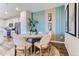 Dining area with contemporary decor and view of kitchen at 14075 Deertrack Ln, Parker, CO 80134