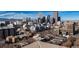 Panoramic cityscape view highlights the skyline and surrounding mountains at 550 E 12Th Ave # 209, Denver, CO 80203