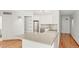 Bright kitchen with stainless steel appliances, ample counter space, and modern cabinetry at 550 E 12Th Ave # 209, Denver, CO 80203
