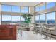 Stunning view room with floor-to-ceiling windows and comfortable seating areas at 550 E 12Th Ave # 209, Denver, CO 80203