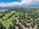 Community overview featuring golf course and mountain views at 6100 W Mansfield Ave # 24, Denver, CO 80235