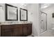 Bathroom with double vanity and a separate shower at 6100 W Mansfield Ave # 24, Denver, CO 80235