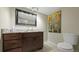 Bathroom with granite vanity and updated fixtures at 6100 W Mansfield Ave # 24, Denver, CO 80235