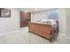 Basement bedroom featuring an egress window, double doors and warm carpet at 16226 W 94Th Dr, Arvada, CO 80007
