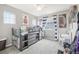 This stylish bedroom has a loft bed with built-in drawers and shelving for optimal organization at 16226 W 94Th Dr, Arvada, CO 80007