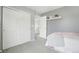 Cozy bedroom featuring a large closet, warm carpet and inviting natural light at 16226 W 94Th Dr, Arvada, CO 80007