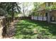 Lush backyard featuring a well-maintained lawn and wooden fence at 14503 E Wagon Trail Dr, Aurora, CO 80015