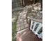 The backyard has a stone paver pathway leading to a wooden fence at 14503 E Wagon Trail Dr, Aurora, CO 80015