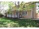 Spacious backyard with a covered deck, ideal for relaxation and entertaining at 14503 E Wagon Trail Dr, Aurora, CO 80015