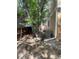 A cozy backyard with a storage shed, small sandbox, and a brick pathway at 14503 E Wagon Trail Dr, Aurora, CO 80015
