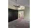 Bedroom featuring attached bathroom, ceiling fan, and built-in wardrobe at 14503 E Wagon Trail Dr, Aurora, CO 80015