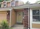 Close up of the front door and address on a brick home at 14503 E Wagon Trail Dr, Aurora, CO 80015