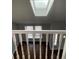 Second-floor hallway with hardwood floors and lots of light at 14503 E Wagon Trail Dr, Aurora, CO 80015