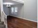 Spacious living room features hardwood floors, neutral paint and natural light at 14503 E Wagon Trail Dr, Aurora, CO 80015