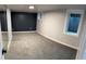 Bedroom with carpet, a dark accent wall and closet with sliding mirror doors at 2201 Lima St, Aurora, CO 80010