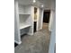 Hallway leading to vanity, bathroom and bedroom at 2201 Lima St, Aurora, CO 80010