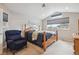 Bedroom featuring vaulted ceilings, a window, and a four-poster bed at 15079 E Poundstone Pl, Aurora, CO 80015