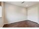 Bright bedroom with wood floors, window with blinds and a closet for storage at 15079 E Poundstone Pl, Aurora, CO 80015