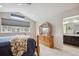 Bright bedroom with a dresser and an ensuite bathroom at 15079 E Poundstone Pl, Aurora, CO 80015