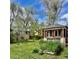 Large backyard including garden area, lawn, and detached building at 3240 Folsom St, Boulder, CO 80304