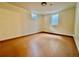 Bedroom features light wood floors, a window, and neutral walls at 3240 Folsom St, Boulder, CO 80304