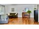 Comfortable living room featuring hardwood floors, large windows, seating area, and piano at 3240 Folsom St, Boulder, CO 80304