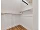 Walk in closet with two levels of metal racks for storage at 1724 W 40Th Ave, Denver, CO 80211
