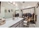 Bathroom with a single sink and combination shower and tub with decorative curtain at 4051 Happy Hollow Dr, Castle Rock, CO 80104