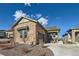 Attractive home with stone accents, gravel landscaping, and a well-maintained lawn and driveway at 4051 Happy Hollow Dr, Castle Rock, CO 80104
